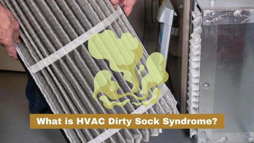Photo of a person taking out an HVAC filter. HVAC Dirty Sock Syndrome