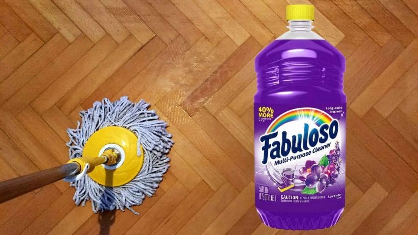Photo of a mop mopping a wood floor and a Fabuloso bottle. Can You Use Fabuloso on Wood Floors?